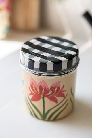 Close-up of the lid of the Orchids & Checkered Spice Tin.