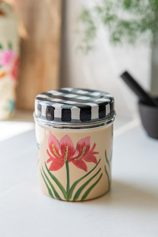 The Orchids & Checkered Spice Tin styled on a kitchen worktop.