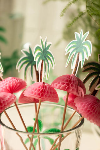 The Palm Tree Party Toothpicks styled together in a glass.