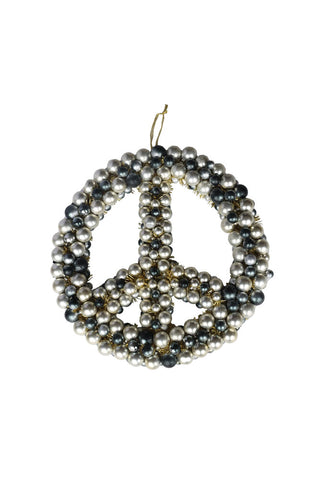 Cutout of the Peace Wreath on a white background.