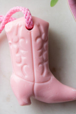 Detail shot of the Pink Cowboy Boot Soap On A Rope.