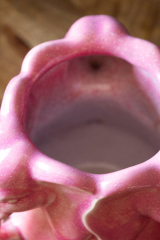 Close-up of the opening of the Pink Elephant Stoneware Vase, seen from above.