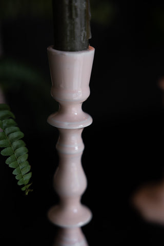 Close-up shot of the Pink Enamel Cast Style Candlestick Holder.