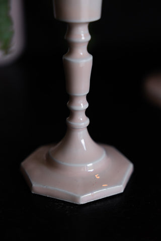 Detail shot of the base of the Pink Enamel Cast Style Candlestick Holder.