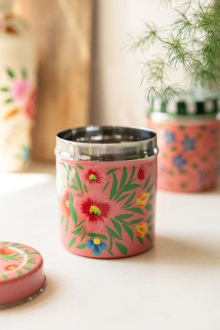 The Pink Floral Spice Tin with the lid off, styled with other kitchen accessories and a plant.