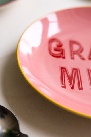 Detail shot of the edge of the Pink Grazie Mille Plate.