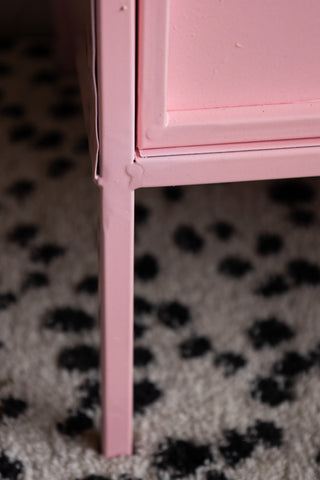 Close-up of of one of the legs of the Pink Industrial-Style Bedside Table.