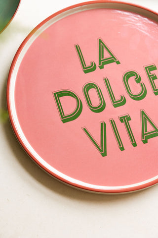 Detail shot of the Pink La Dolce Vita Plate on a white surface.