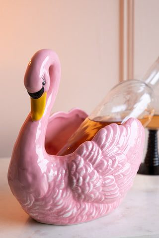 Pink Swan Display Bowl used as a wine holder 