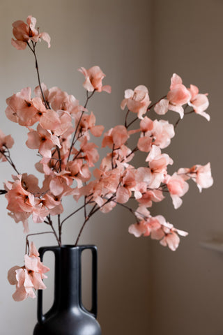 The Pretty Pink Blossom Flower Stem styled in a large vase.