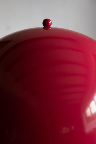 Close-up of the top of the shade of the Raspberry Red Wavy Retro Floor Light.