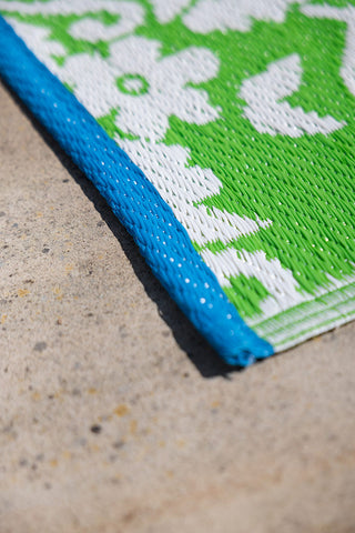 Close-up of the Recycled Vintage Design Outdoor Rug in Green.