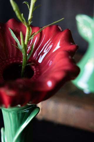 Close-up of the flower on the Red Flower Earthenware Single Stem Vase.