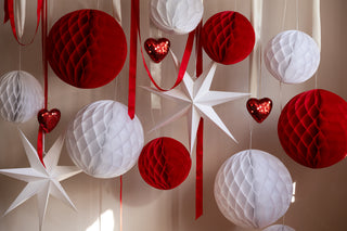 Red and white honeycomb ball decorations 