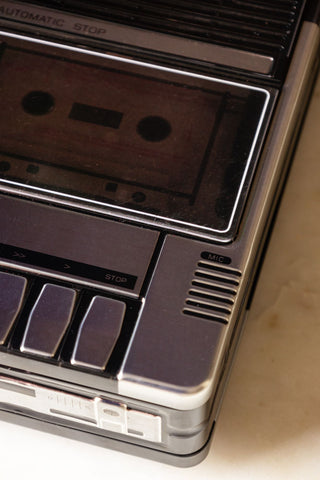 Close-up of one corner of the Retro Cassette Recorder Storage Tin with the lid on.