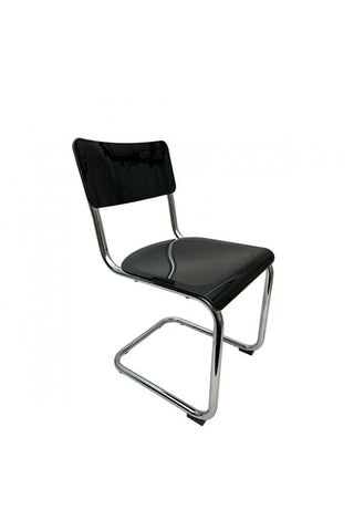 Cutout of the Retro Inspired Curved Dining Chair in Black on a white background.