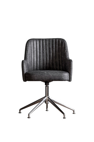 Cutout of the Ribbed Antique-Style Black Leather Swivel Chair on a white background.