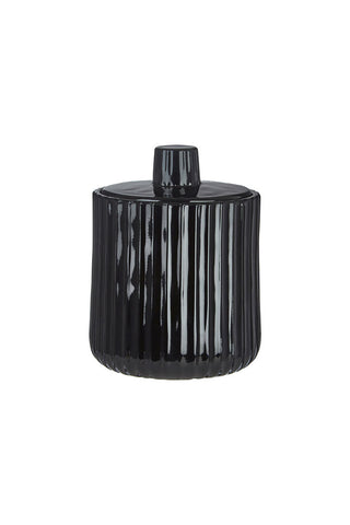 Cutout of the Ribbed Black Glass Storage Canister on a white background.