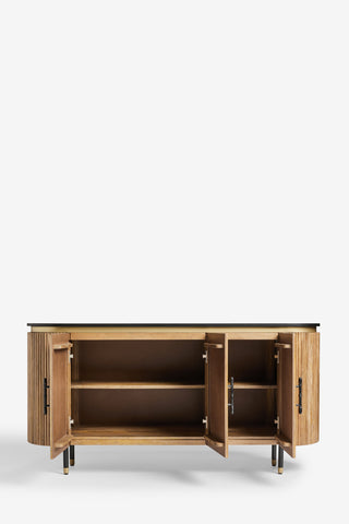 The Ribbed Sideboard on a white background with all of the doors open.