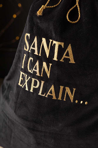 Close-up of the text on the Luxury Santa I Can Explain Velvet Christmas Sack.