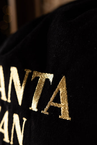 Detail shot of the text on the Santa I Can Explain Velvet Christmas Sack.