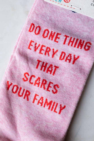 Close-up of the text on the Scares Your Family Crew Socks.