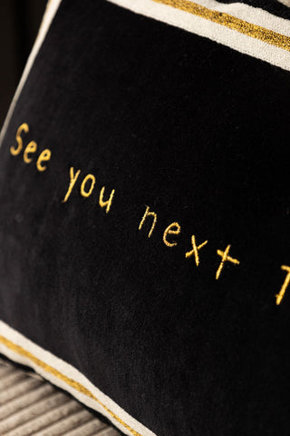 Detail shot of the text on the See You Next Tuesday Cushion.