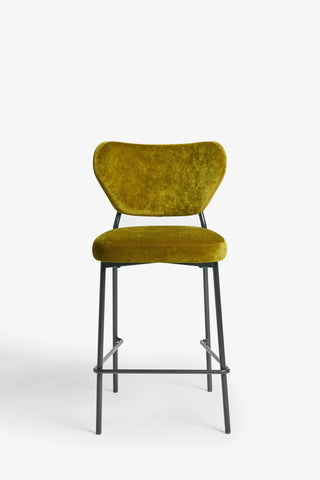 One of the Set Of 2 Bar Stools in Needlecord Velvet Green in front of a white background.