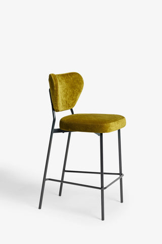 One of the Set Of 2 Bar Stools in Needlecord Velvet Green on a white background, seen from a side angle.