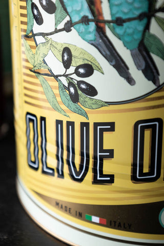 Close-up of the design on one of the Set Of 2 Olive Oil Storage Tins - Large.