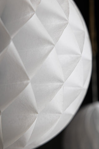 Detail shot of one of the Set Of 2 White Honeycomb Balls.