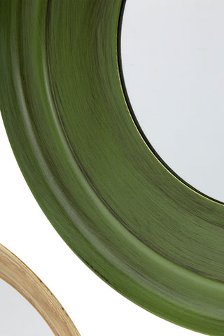 Close-up of one of the green mirrors from the Set Of 5 Metal Frame Mirrors in Green & Natural.