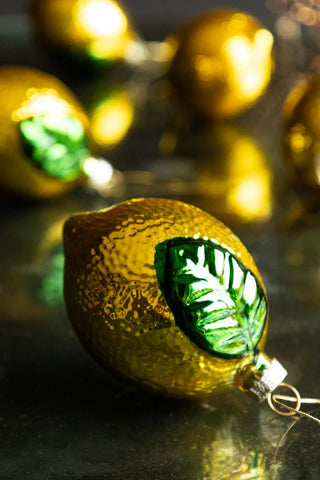 Yellow lemon christmas tree decoration on a table