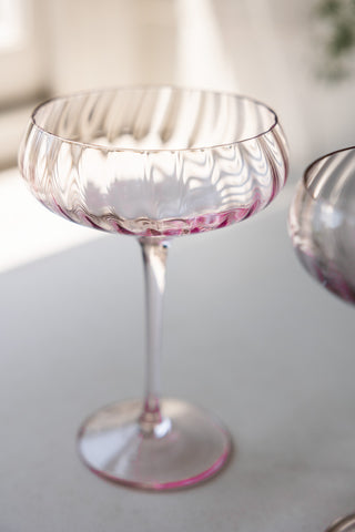 Detail shot of one of the Set of 2 Scalloped Coupe Cocktail Glasses.