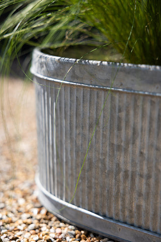 Close-up shot of one of the Set of 3 Antiqued Planters.