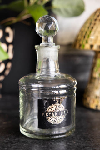 Close-up of the cyanide bottle from the Set of 3 Apothecary-Style Poison Decanter Bottles.