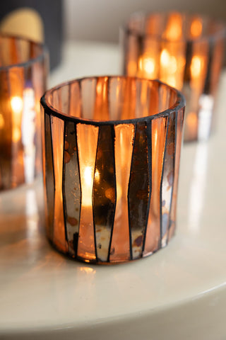 Close-up of the Set of 3 Metallic Mosaic Effect Glass Tealight Holders with lit tealights inside.