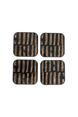 Cutout of the Set of 4 Black & Gold Brushstroke Coasters on a white background.