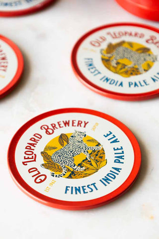Close-up shot of the Set of 4 Old Leopard Brewery Coasters.
