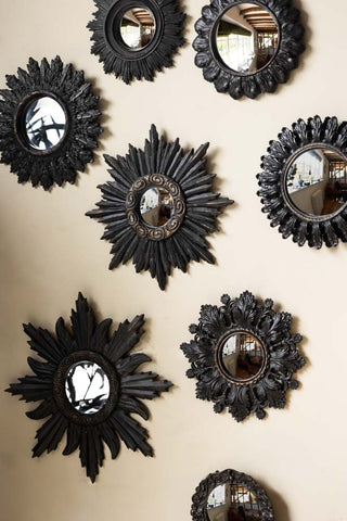 The Set of 9 Ornate Antique Black Framed Mirrors displayed on a neutral wall.