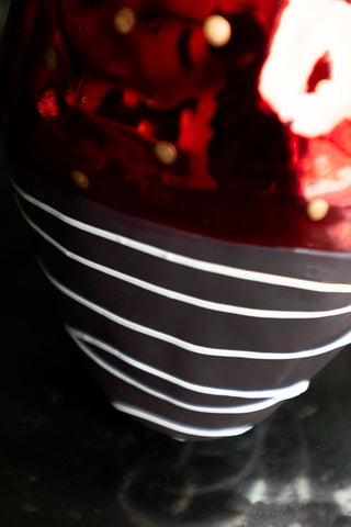 The chocolate dipped bottom of the strawberry christmas tree decoration.