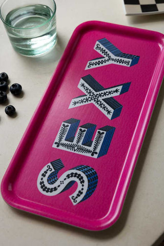 The Sexy Bright Pink Tray styled with a glass, blueberries and monochrome trinket tray.