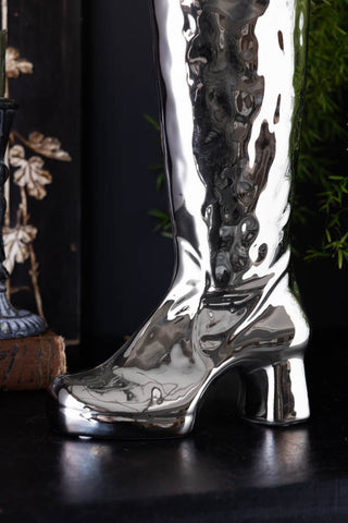 Close-up of the base of the Fabulous Silver Chrome Boot Vase.