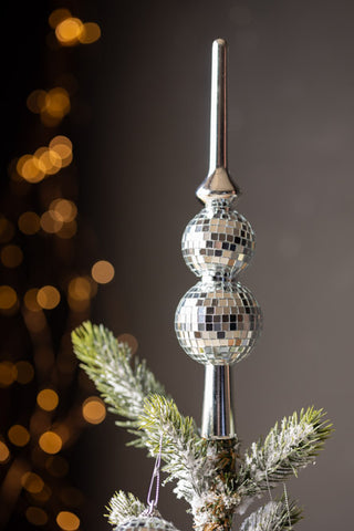 Image of the Silver Disco Ball & 10 Disco Ball Christmas Tree Decoration Set styled on top of a christmas tree.