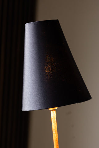 Detail shot of one of the shades of the Sleek Black & Gold Double Shade Floor Lamp.