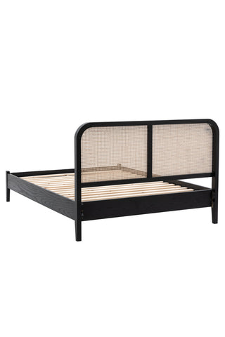 Cutout of the Sleek Curved Wooden Bedframe seen from the back.