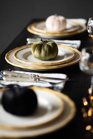 The Small Green Velvet Pumpkin styled on a Halloween tablescape.