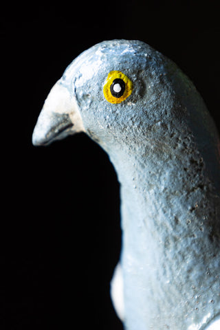 Close-up of the face of the Quirky Pigeon Ornament.