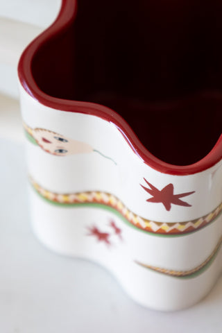 Close-up of the Star Shaped Mug with Snake Print Detail, seen from above.