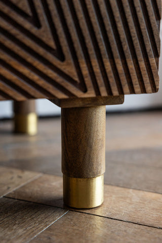 Close-up of one of the legs of the Starburst Bedside Table.